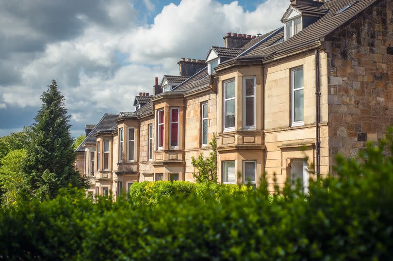 Blonde Sandstone Terraced Homes on a Tree Lined Street in Glasgow Scotland