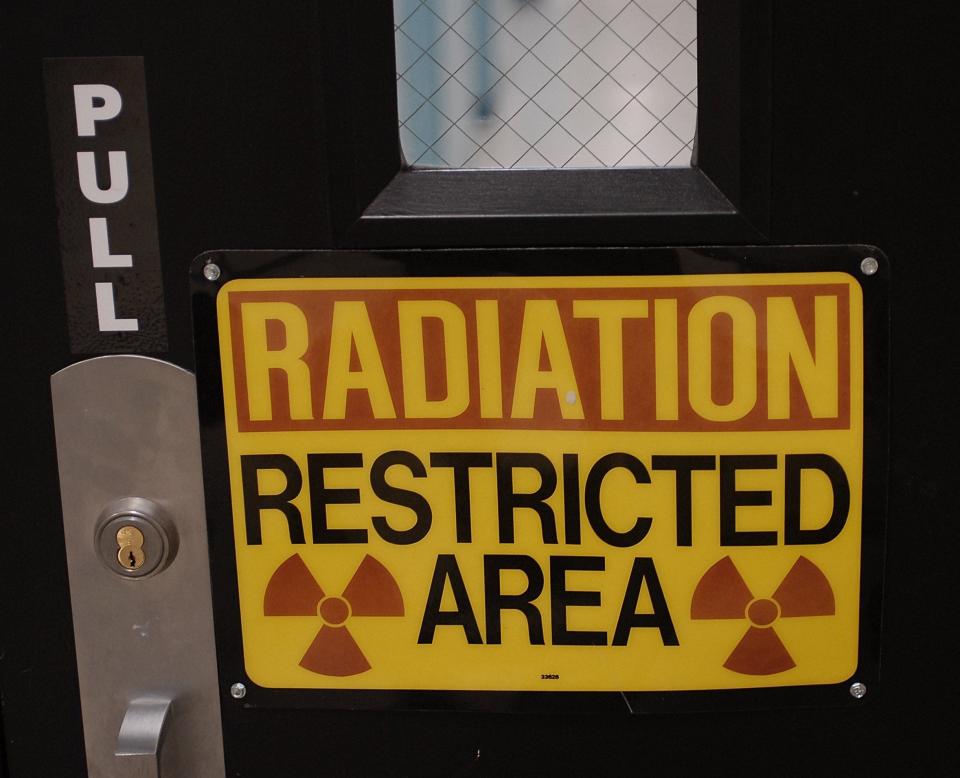 A warning sign on a door at MSU's National Superconducting Cyclotron Laboratory in 2006 in East Lansing.