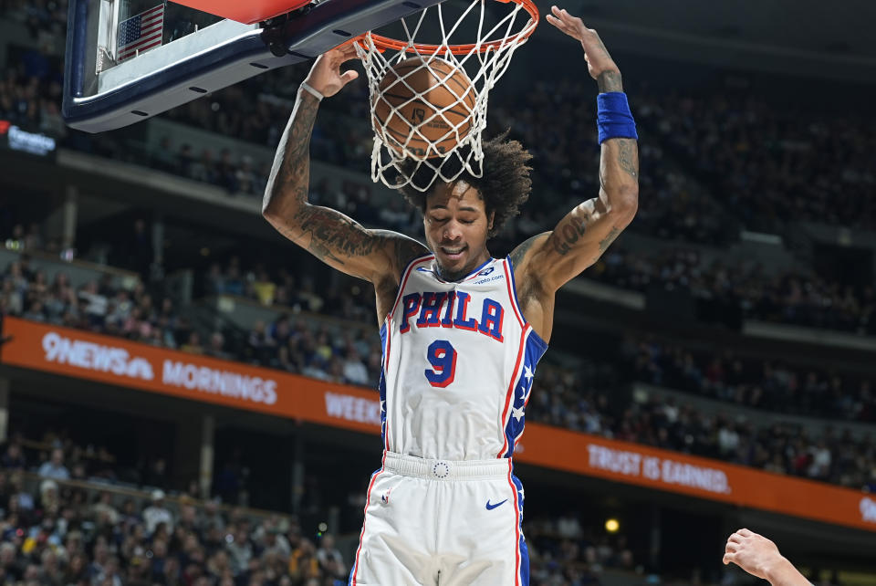 Philadelphia 76ers guard Kelly Oubre Jr. dunks in the first half of an NBA basketball game against the Denver Nuggets, Saturday, Jan. 27, 2024, in Denver. (AP Photo/David Zalubowski)