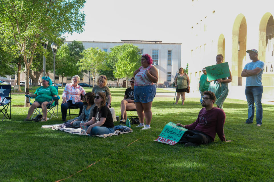 A group of women's health care advocates attend a rally Monday afternoon to protest the two-year anniversary repeal of Roe V. Wade at the Potter County Courthouse in Amarillo.