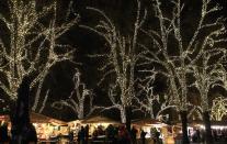 People visit a Christmas market in downtown Budapest, December 11, 2013. REUTERS/Bernadett Szabo (HUNGARY - Tags: SOCIETY TRAVEL)