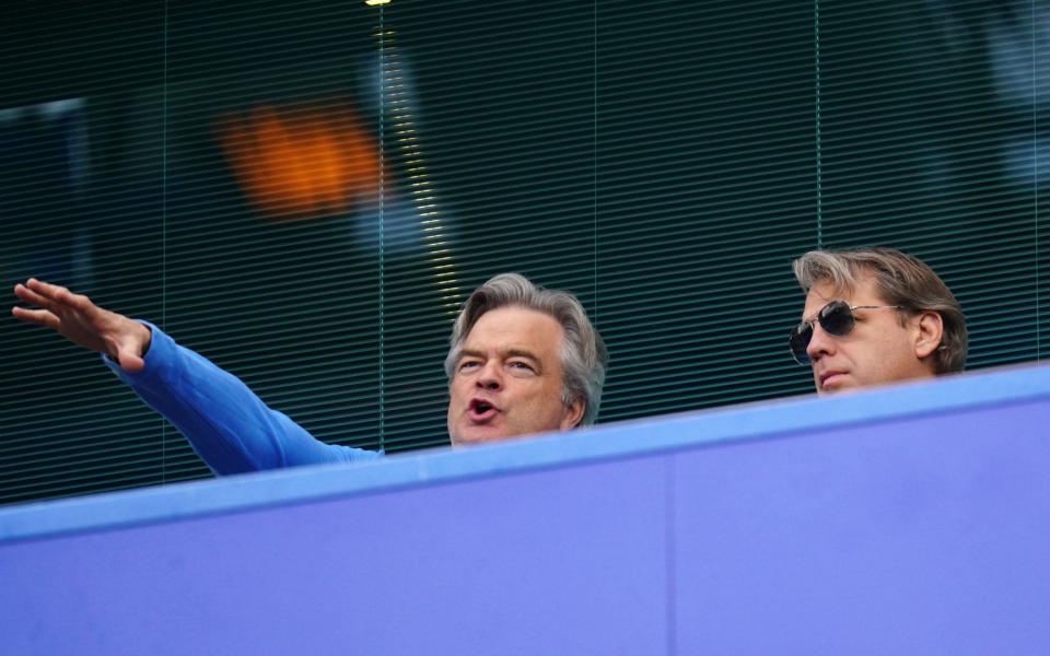 Todd Boehly (right) in the stands before the Premier League match at Stamford Bridge - Adam Davy/PA