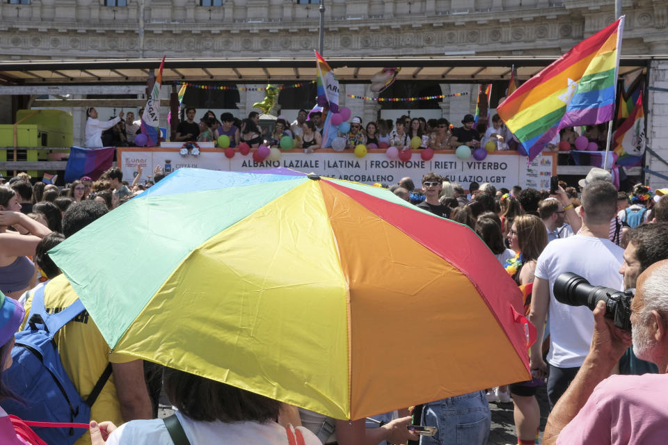Participants in the LGBTQ+ Pride parade in Rome, Saturday, June 10, 2023. Rome’s annual LGBTQ+ Pride parade was winding its way through the Italian capital on Saturday, providing a colorful counterpoint to the right-wing national government’s crackdown on surrogate pregnancies. Some three dozen floats joined the event, including one celebrating what LGBTQ+ activists dub the “rainbow families” of same-sex couples with children. (Mauro Scrobogna/LaPresse via AP)