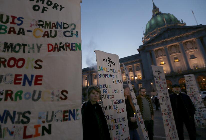 San Francisco, CA - Homeless activists hold a memorial outside San Francisco City Hall for the dozens of people who have died unhoused on the city's streets. Steeped in history, culture and wealth, San Francisco now has a dubious reputation for intractable homelessness, rampant crime and an exodus of business. (Luis Sinco / Los Angeles Times)