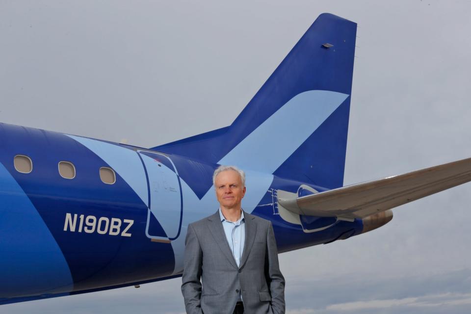 David Neeleman in front of Breeze's Embraer E-190 aircraft. (CeanOrrett/Courtesy Breeze Airways)