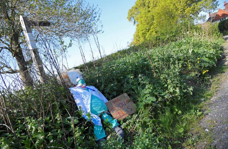 Scarecrows representing key workers lighten the daily lockdown walk, as the number of the coronavirus disease cases (COVID-19) grows around the world, in the village of Capel