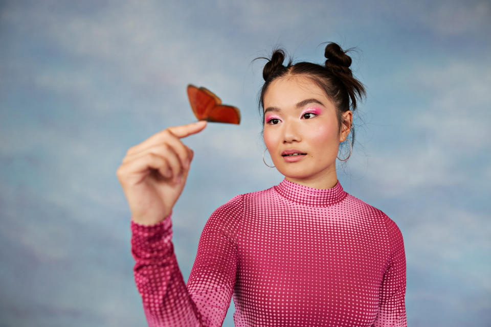 Person looking at a butterfly