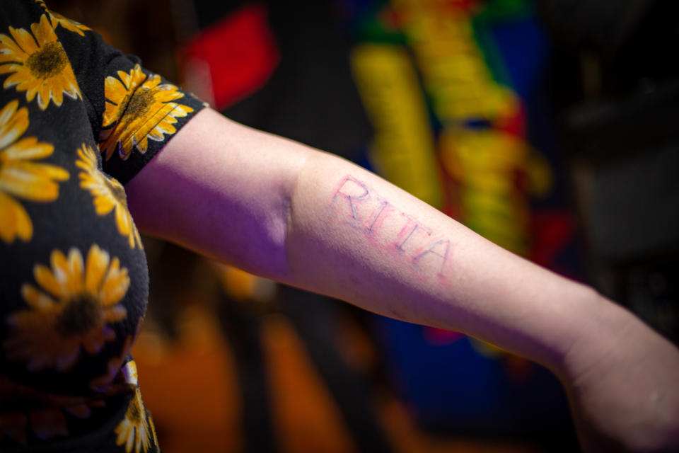 Image: Kate Noonan's arm reads 'Rita.' (Kate Sosin / for NBC News)