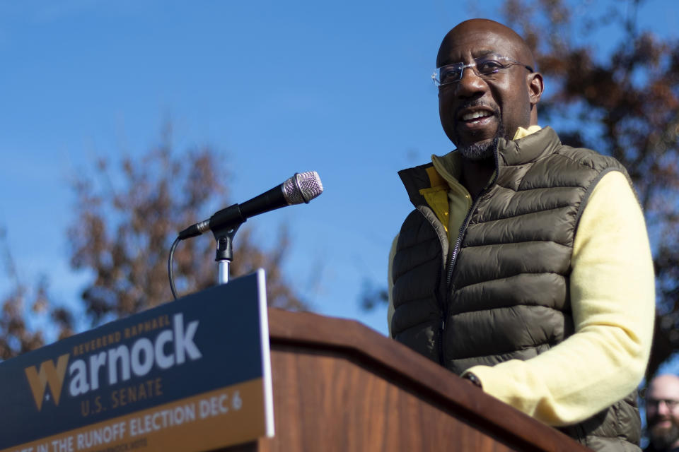 Sen. Raphael Warnock, D-Ga., speaks at a rally in Sandy Springs, Ga., on Saturday, Nov. 26, 2022. Georgia counties will be allowed to hold early voting this Saturday in the U.S. Senate runoff election between Warnock and Republican challenger Herschel Walker. (AP Photo/Ben Gray)