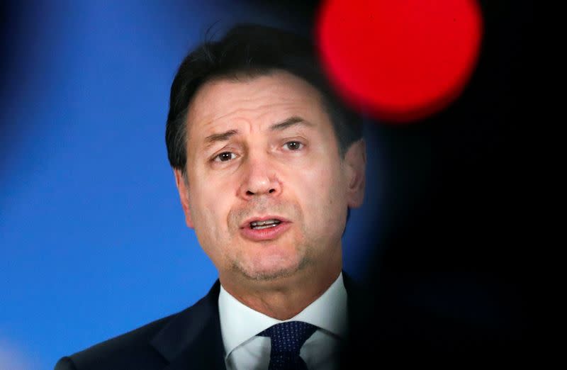 Italian Prime Minister Giuseppe Conte holds a news conference at the end of an EU summit in Brussels