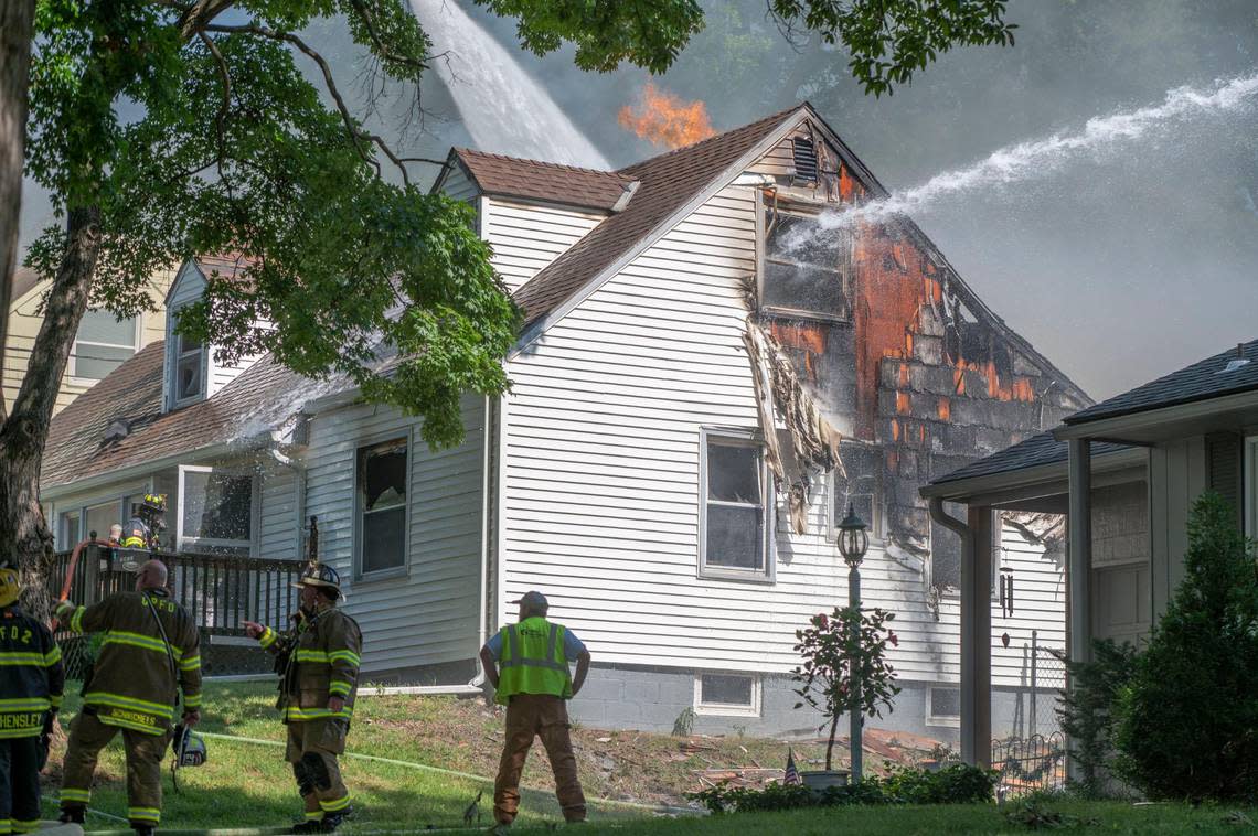 Firefighters respond to a house fire in the 3400 block of West 73rd Terrace in Prairie Village on Tuesday, July 5, 2022.