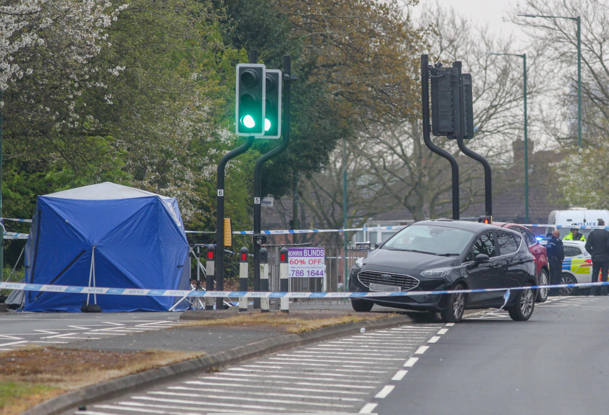 A black Ford Fiesta was left damaged after crashing into railings near a pedestrian crossing in Castle Bromwich, Birmingham. (SWNS)