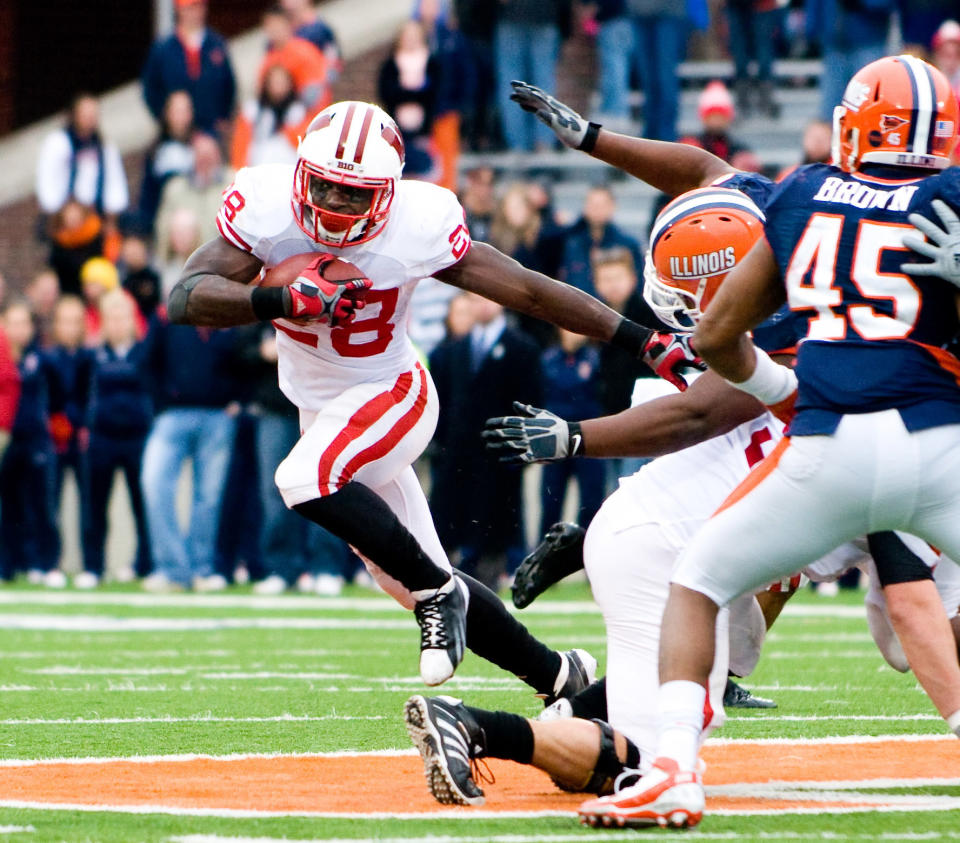 Nov 19, 2011; Champaign, IL, USA; Wisconsin Badgers running back Montee Ball (28) runs the ball against the Illinois Fighting Illini during the fourth quarter at Memorial Stadium. Mandatory Credit: Bradley Leeb-USA TODAY Sports