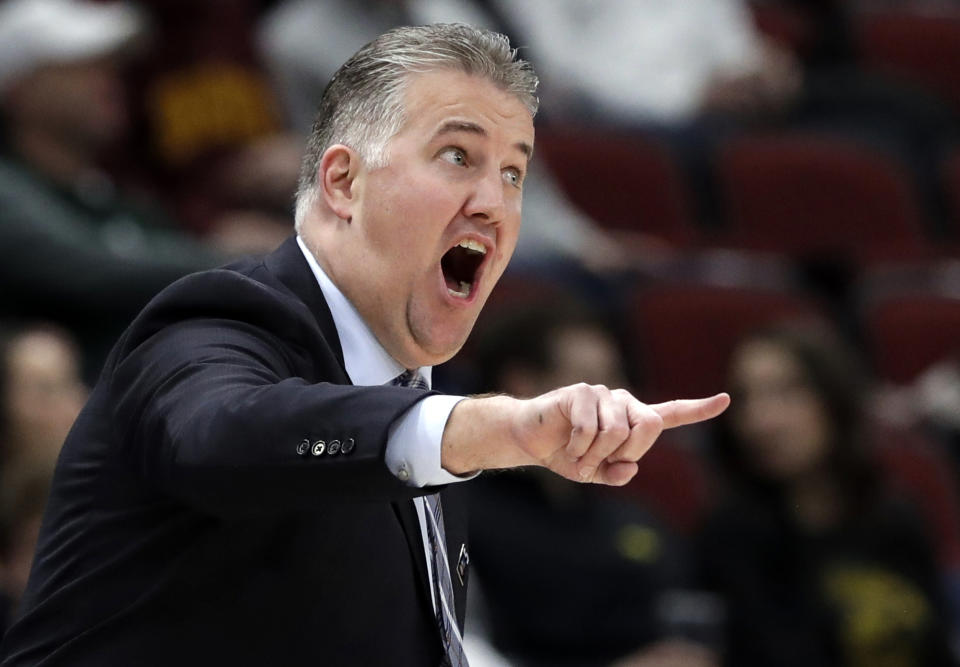 FILE - In this Friday, March 15, 2019, file photo, Purdue head coach Matt Painter directs his top team during the first half of an NCAA college basketball game against Minnesota in the quarterfinals of the Big Ten Conference tournament in Chicago. In a landscape where one-and-done or two-and-done players have become all the rage, Painter has largely ignored the trend by building Purdue’s program with players who expect to stay four years and cherish a degree. (AP Photo/Nam Y. Huh, File)