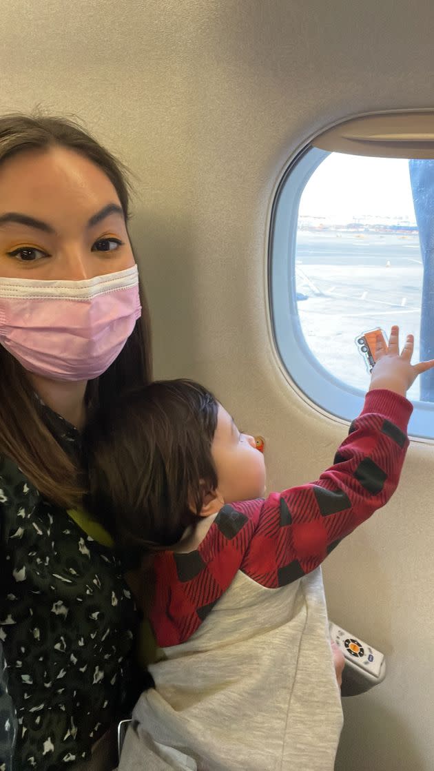 Blogger Lina Forrestal and her son Archie on a flight from New Jersey to Florida. (Photo: <a href=