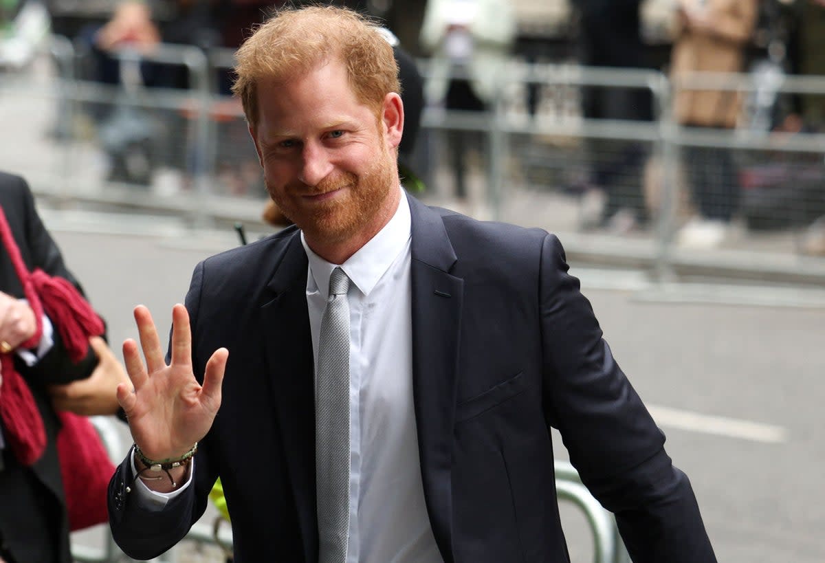 Prince Harry, Duke of Sussex, waves as he arrives to the Royal Courts of Justice, Britain's High Court, in central London on June 7, 2023 (AFP via Getty Images)