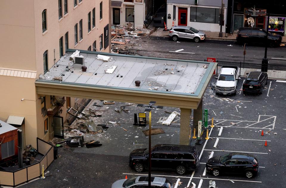 Debris is seen near the Sandman Signature hotel after an explosion on Monday, Jan. 8, 2023, in Fort Worth, Texas.