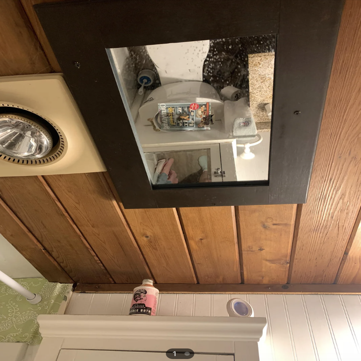 A mirror on the ceiling