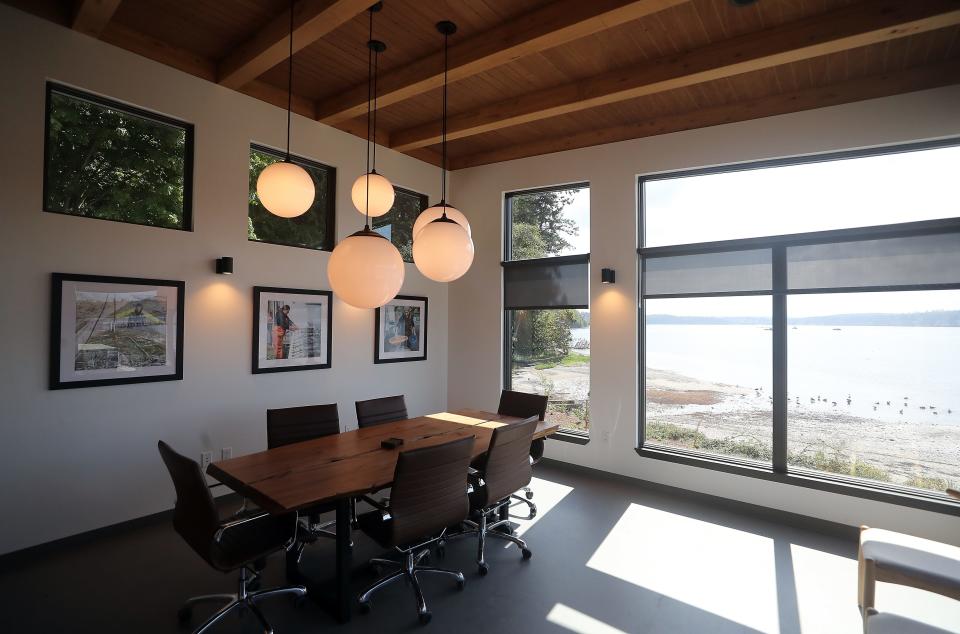 A newly built conference room overlooks the water at the Little Boston Fish Hatchery on Tuesday, Sept. 5, 2023.