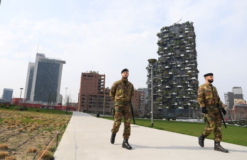 Italian army soldiers patrol streets after being deployed to the region of Lombardy to enforce the lockdown against the spread of coronavirus disease (COVID-19) in Milan