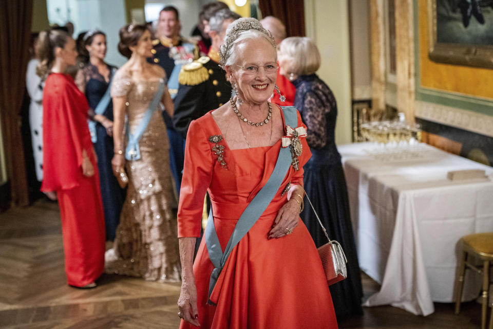 FILE _ Queen Margrethe II of Denmark greets guests during a break at the Danish Royal Theatre to mark the 50th anniversary of Danish Queen Margrethe II's accession to the throne in Copenhagen, Saturday, Sept. 10, 2022. Denmark’s popular monarch, Queen Margrethe II, has said that the “strong reactions” to her decision to strip the royal titles from four of her grandchildren have affected her, sparking reports in the Danish press of tense relations within Europe’s oldest ruling monarchy. (Ida Marie Odgaard/Ritzau Scanpix via AP, File)