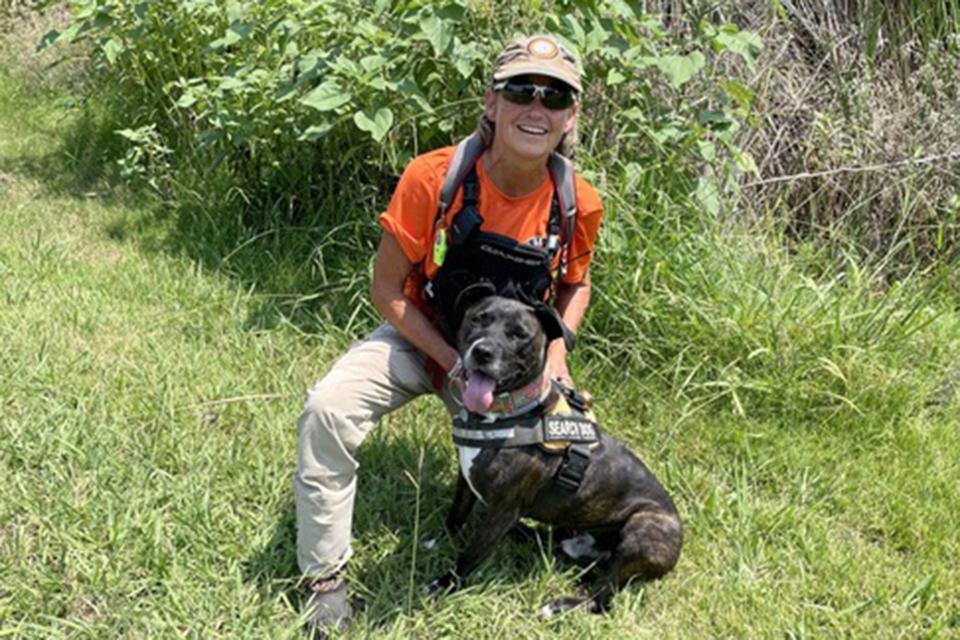 Molly Gibb and Little Man, dog hero