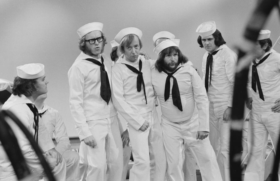 Comedians (L-R) Graeme Garden, Tim Brooke-Taylor and Bill Oddie in a sketch from episode 'For Those in Peril on the Sea' of the BBC television series 'The Goodies', January 4th 1973. (Photo by Don Smith/Radio Times via Getty Images)