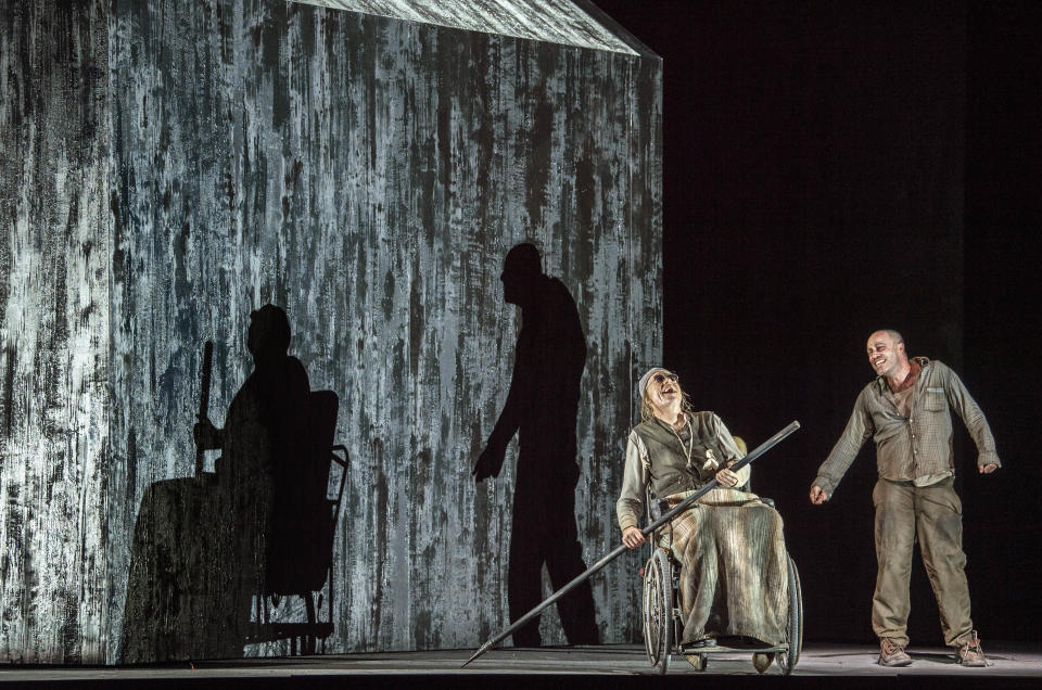 In this photo taken on Nov. 11, 2018 Leigh Melrose and Frode Olsen, left, perform during rehearsals of Gyoergy Kurtag's opera 'Fin de Partie' at the Milan La Scala opera house, Italy. The long-awaited premiere of composer Georgy Kurtag's first-ever opera at Milan's La Scala opera house, based on a Beckett play, ''Fin de Partie'' is being billed as the most important opera premiere of the last 50 years and it is scheduled to go on stage Thursday, Nov. 15, 2018. (Ruth Walz via AP)