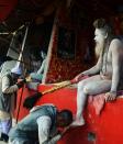 <p>Indian sadhus offer blessings to Hindu devotees at a temporary camp on Gangasagar Island, around 150 km south of Kolkata, on January 13, 2016. More than 500,000 Hindu pilgrims and sadhus are expected to gather at the confluence of the River Ganges and the Bay of Bengal during the Gangasagar Mela to take a ‘holy dip’ in the ocean on the occasion of Makar Sankranti, a holy day of the Hindu calendar considered to be of great religious significance in Hindu mythology. </p>