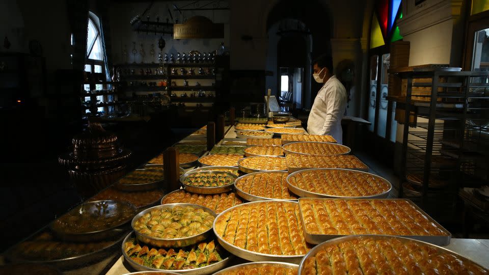 Prepared baklava trays are displayed at a bakery in Turkey's southeastern city of Gaziantep on April 08, 2019. - Mehmet Akif Parlak/Anadolu Agency/Getty Images