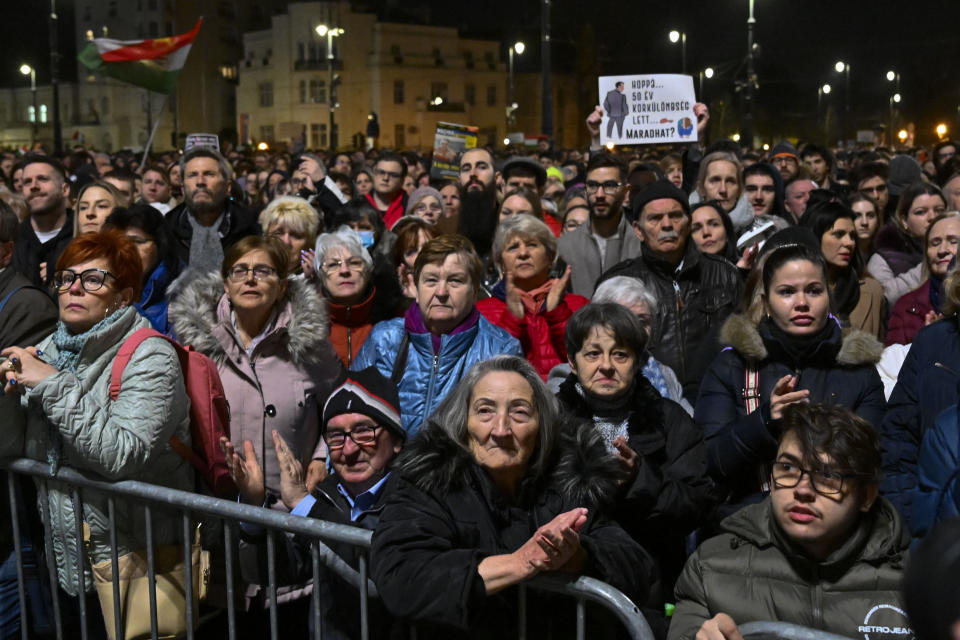 People stage a protest, at Heroes' Square in Budapest, Hungary, Friday, Feb. 16, 2024. Protesters demand a change in the country's political culture after the conservative head of state resigned amid scandal over a presidential pardon. (AP Photo/Denes Erdos)