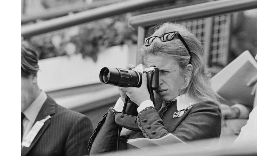 Princess Anne taking a photograph at the 1972 Summer Olympics in Munich, West Germany