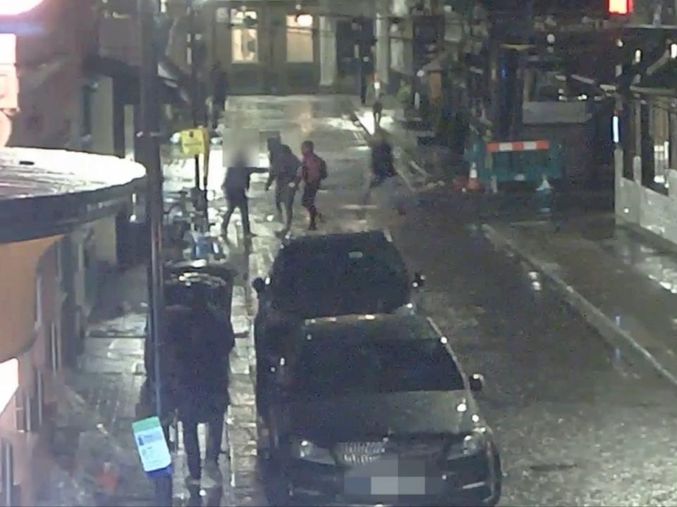 CCTV shows men attempted to rob a luxury watch from an undercover officer in London’s Greek Street in November 2022 (Met Police)