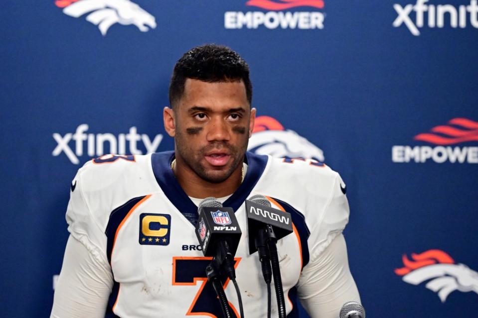 Denver Broncos quarterback Russell Wilson addresses the media after an NFL football game against the Detroit Lions, Saturday, Dec. 16, 2023, in Detroit. AP