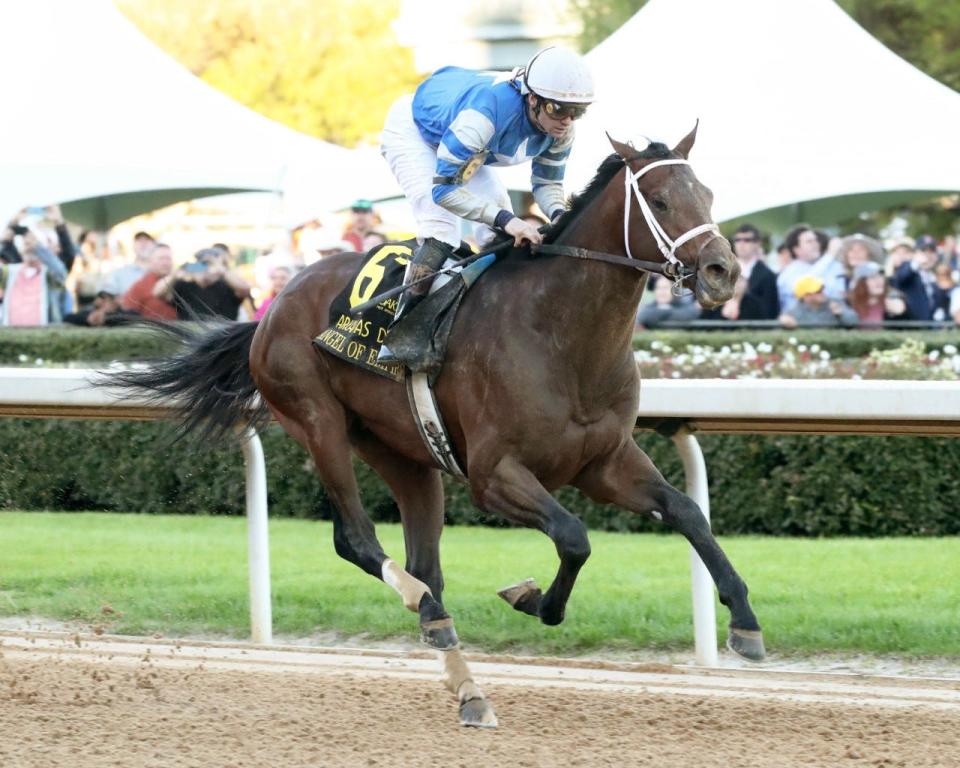 Angel of Empire and jockey Flavien Prat win the Grade 1 Arkansas Derby on April 1 at Oaklawn Park.