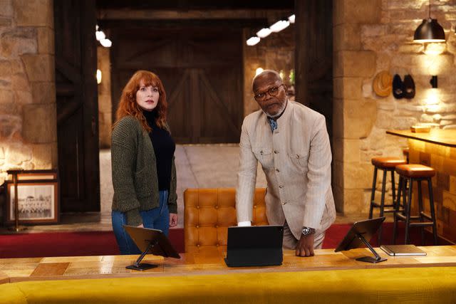 <p>Peter Mountain/Universal Pictures</p> Bryce Dallas Howard and Samuel L. Jackson in "Argylle."