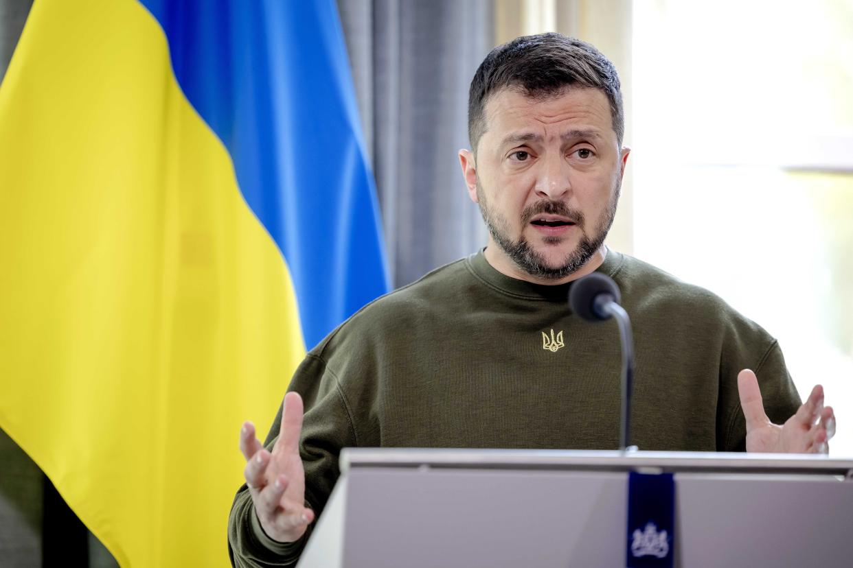 Ukrainian President Volodymyr Zelensky addresses a press conference during his visit at the Catshuis in the Hague (EPA)