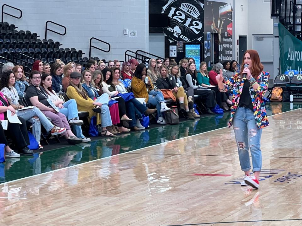 Motivational speaker Ali Starr talking to a section of the crowd March 2, 2024, at the Wisconsin HER Day event. The event drew 225 participants to the Oshkosh Arena.