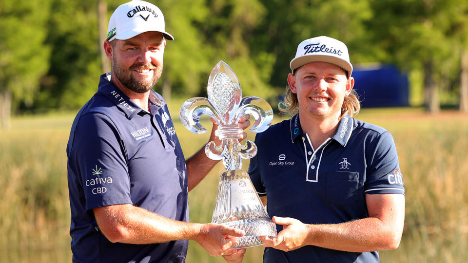 Marc Leishman and Cameron Smith, pictured here with the trophy after winning the Zurich Classic.