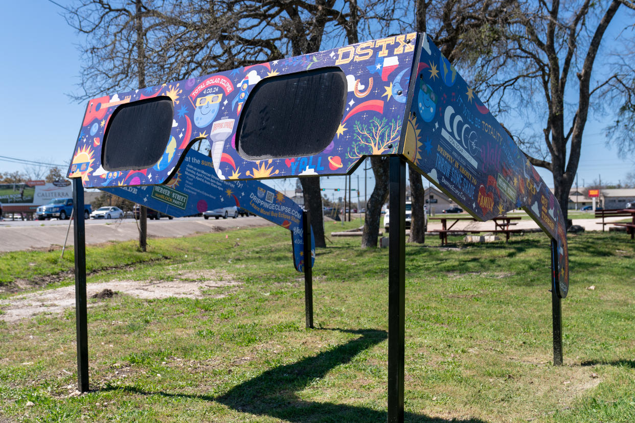A set of larger than life eclipse glasses is on display at Veterans Memorial Park in Dripping Springs Texas.