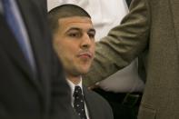 Former NFL player Aaron Hernandez listens as the guilty verdict is read during his murder trial at the Bristol County Superior Court in Fall River, Massachusetts, April 15, 2015. Hernandez, 25, a former tight end for the New England Patriots, is convicted of fatally shooting semiprofessional football player Odin Lloyd in an industrial park near Hernandez's Massachusetts home in June 2013. REUTERS/Dominick Reuter