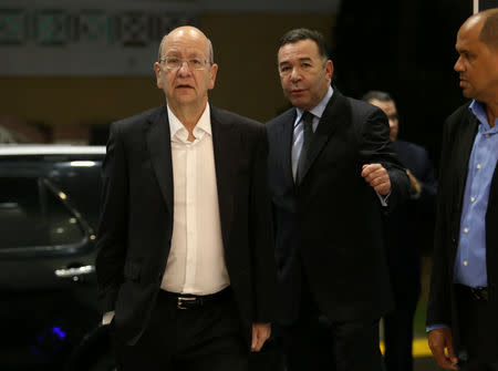 Vicente Diaz (L), representative of the Venezuelan coalition of opposition parties (MUD), arrives for a third round of talks with delegates of President Nicolas Maduro's government, in Santo Domingo, Dominican Republic January 11, 2018. REUTERS/Roberto Guzman