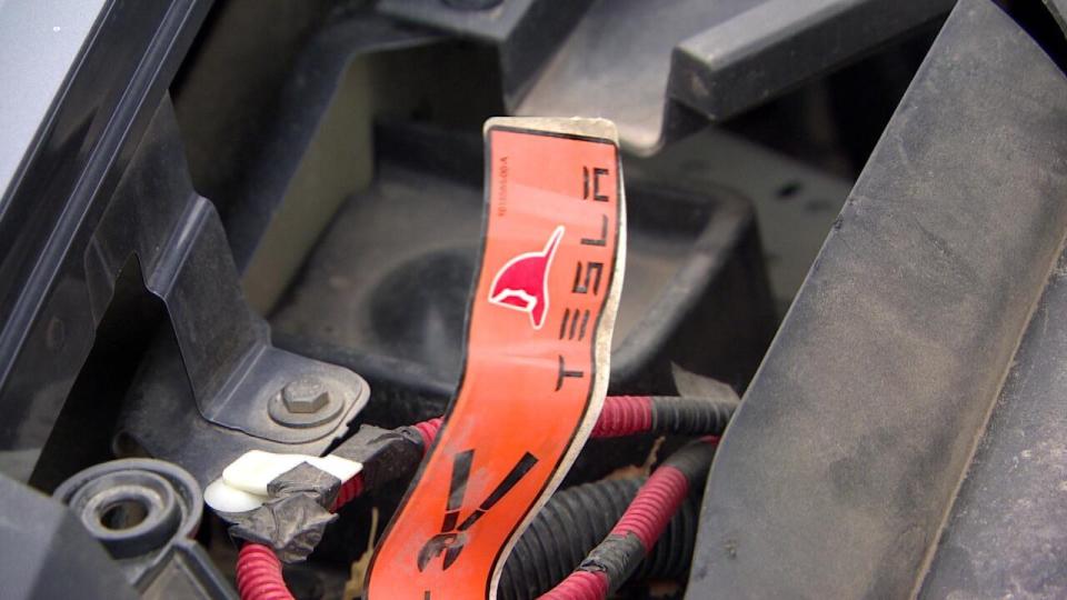 Power cables with first responder instructions in a Tesla.