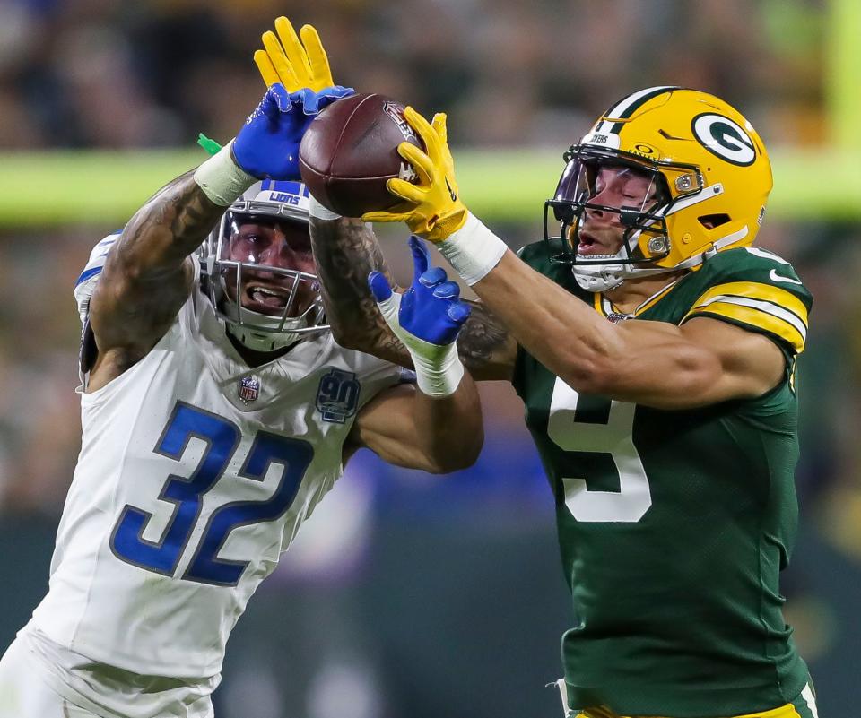 Detroit Lions safety Brian Branch breaks up a pass intended for Green Bay Packers receiver Christian Watson on Thursday, Sept. 28, 2023, at Lambeau Field in Green Bay, Wis.