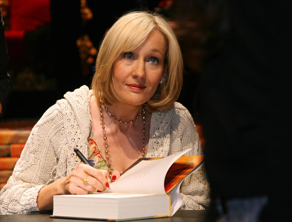 British writer J.K. Rowling signs copies of 