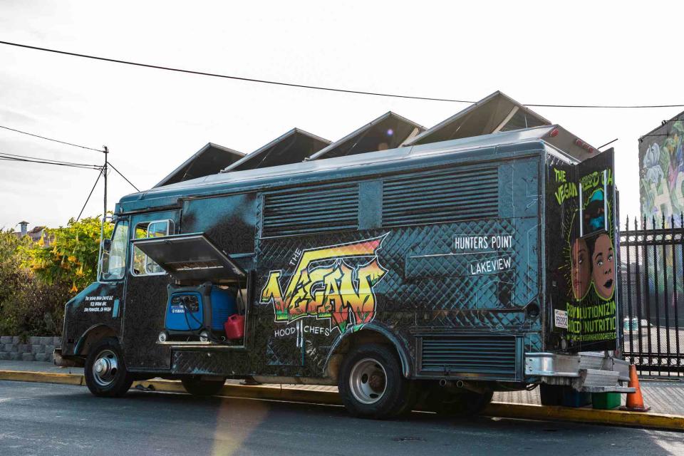 The Vegan Hood Chefs parked outside out 7 Stars Holistic Healing Center for a pop-up