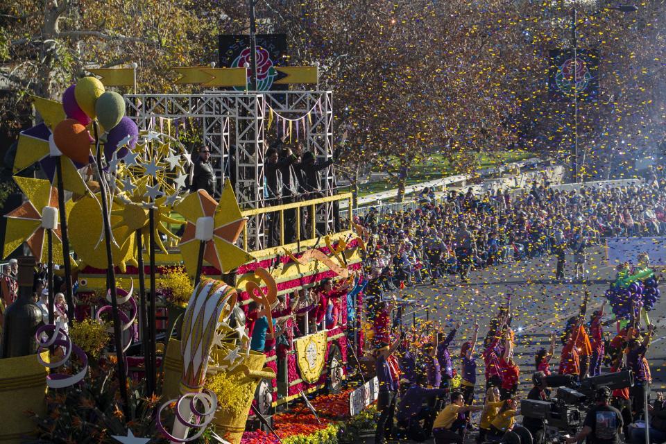 Stella Rosa Wines float "Stellabrate Good Times" moves along Orange Grove Boulevard during the 125th Tournament of Roses Parade in Pasadena, Calif., Wednesday, Jan. 1, 2014. (AP Photo/Ringo H.W. Chiu)