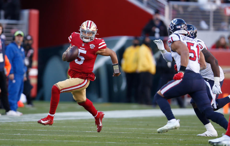 SANTA CLARA, CA - JANUARY 2: Trey Lance #5 of the San Francisco 49ers rushes during the game against the Houston Texans at Levi's Stadium on January 2, 2022 in Santa Clara, California. The 49ers defeated the Texans 23-7. (Photo by Michael Zagaris/San Francisco 49ers/Getty Images)