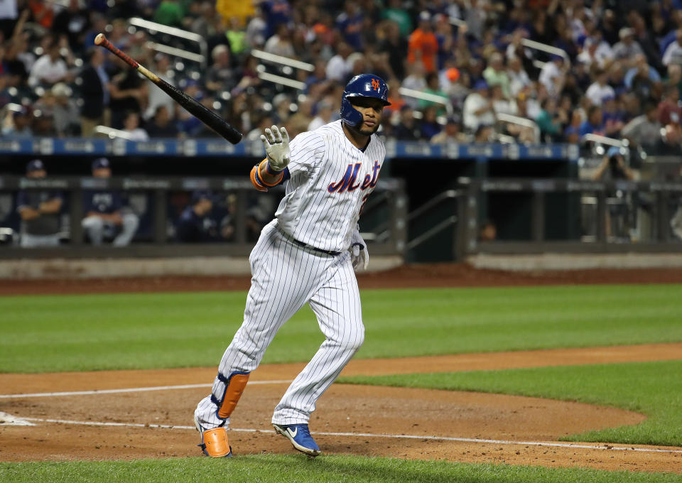 NEW YORK, NEW YORK - JULY 23:  Robinson Cano #24 of the New York Mets hits a fourth inning home run against the San Diego Padres during their game at Citi Field on July 23, 2019 in New York City. (Photo by Al Bello/Getty Images)