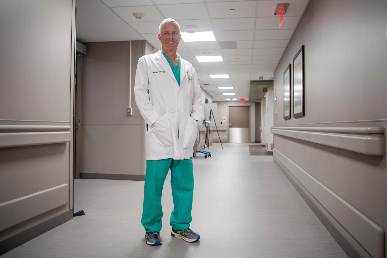 Dr. Michael Schurr stands in the hallway of Mission Hospital’s new burn, wound and hyperbaric center July 27, 2023.